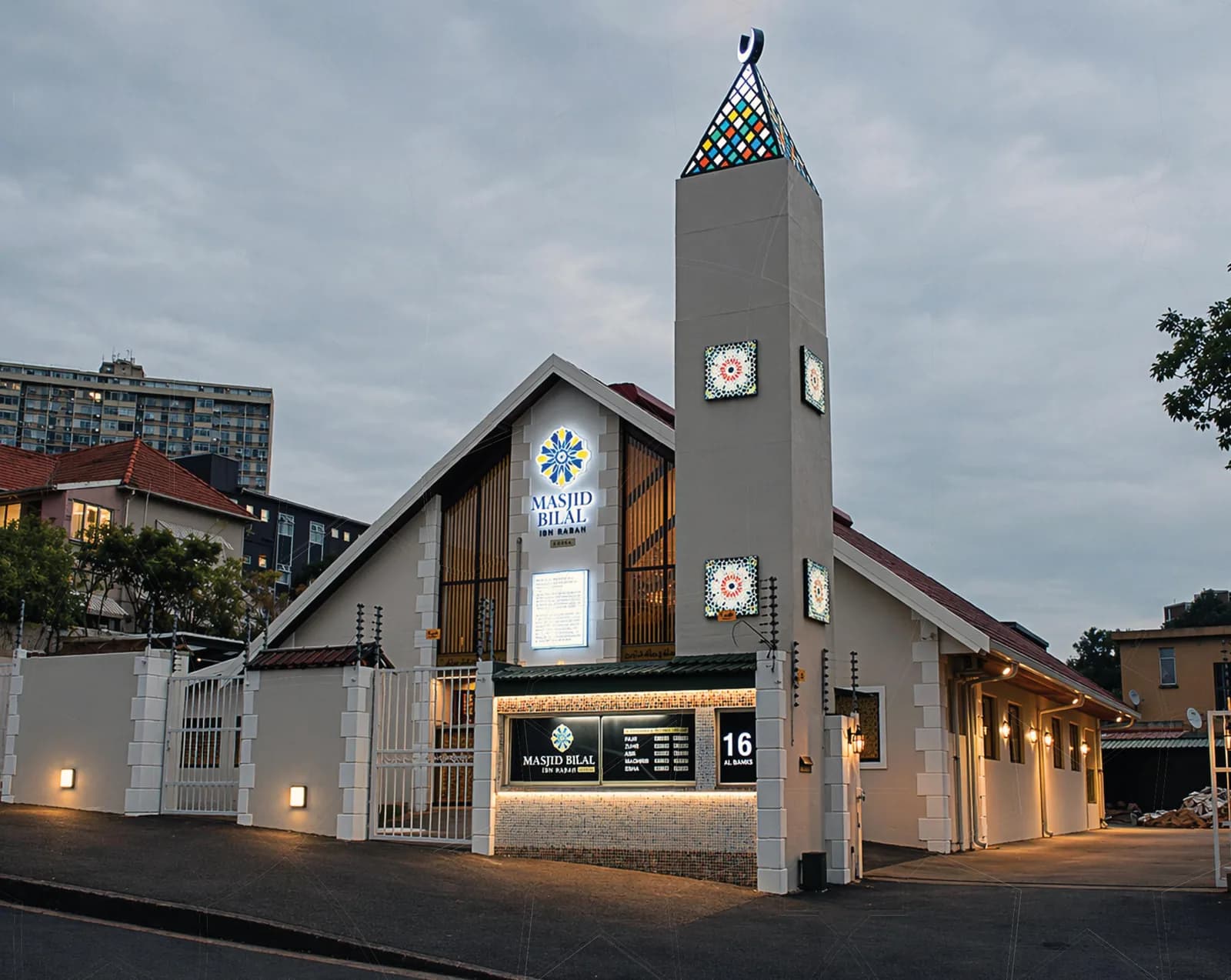 Masjid Bilal Ibn Rabah lit up at dusk on J.B. Marks Road